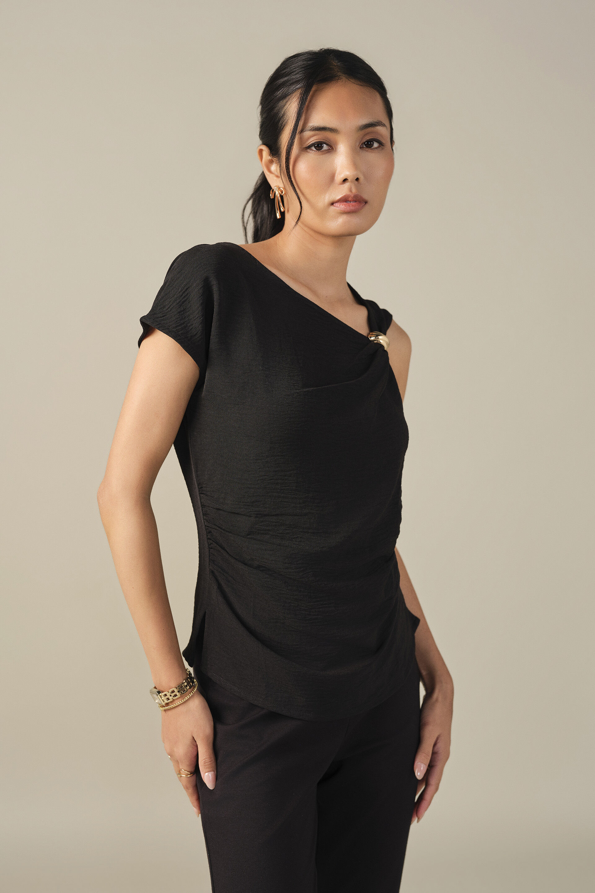 Solid Asymmetric Neckline Top in Black